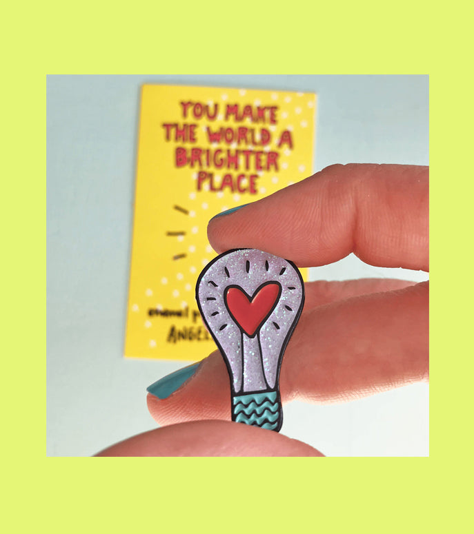 Angela Chick - You Make The World A Brighter Place Enamel Pin